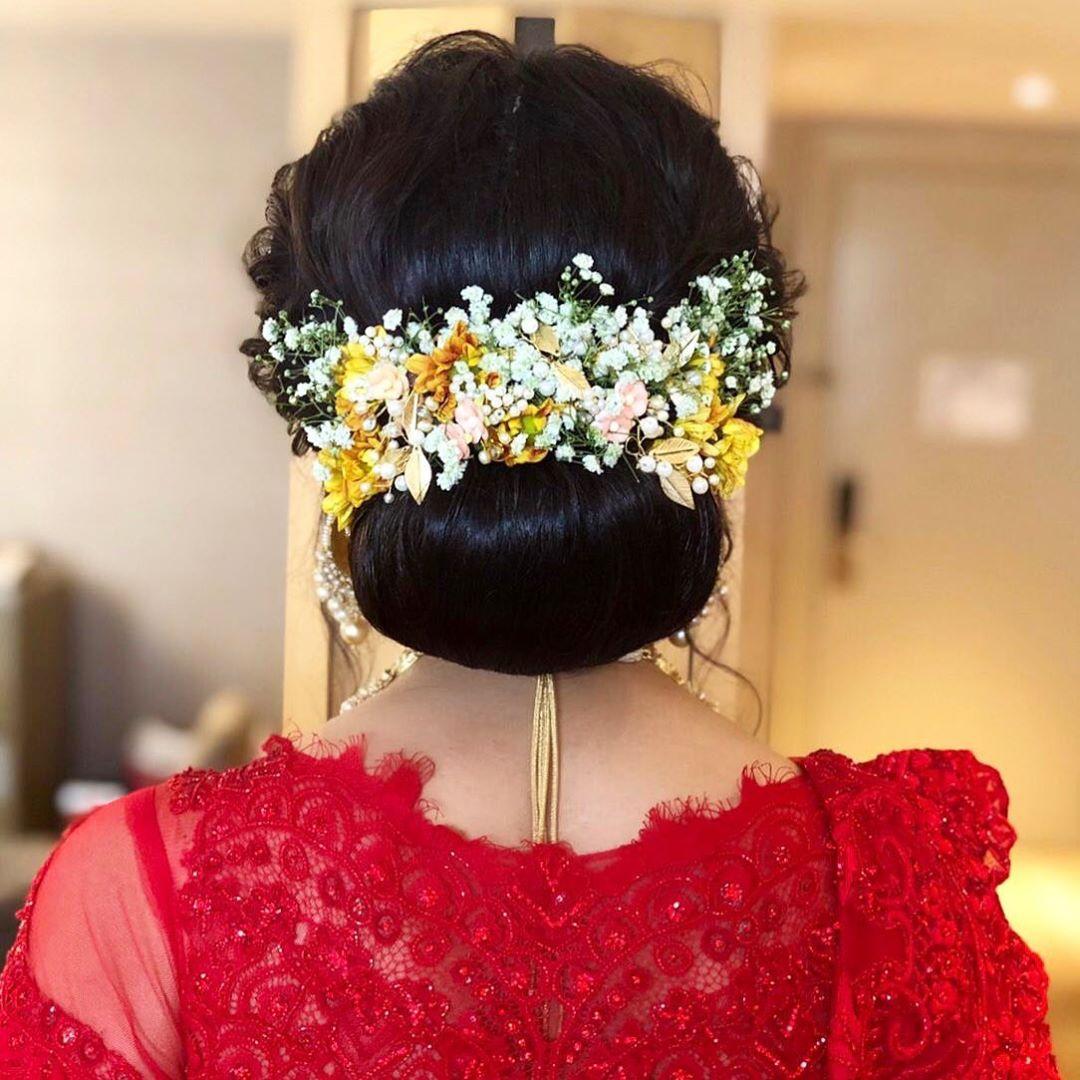 Beautiful hair style with real flowersflower bun hairstylelatest side  flower bun style for wedding  YouTube