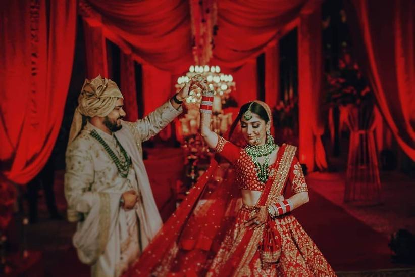 Palak Muchhal in heavy red lehenga exudes traditional charm in wedding pics  with Mithoon - India Today