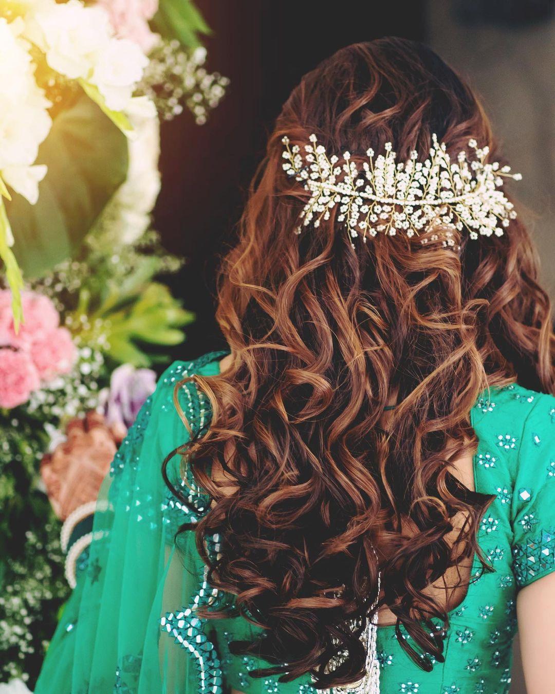 Princess style hairstyle with pearls