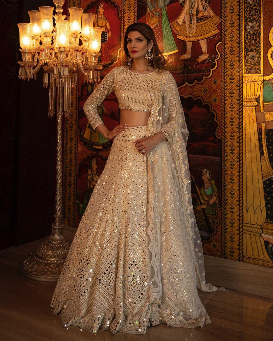 Sonam Kapoor Looks Divine In An Ivory And Gold Lehenga At Her Sangeet  Ceremony
