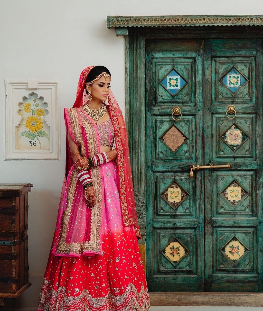 Photo of Red and pink lehenga by Anamika Khanna | Indian bridal wear,  Bridal lehenga red, Indian bridal lehenga