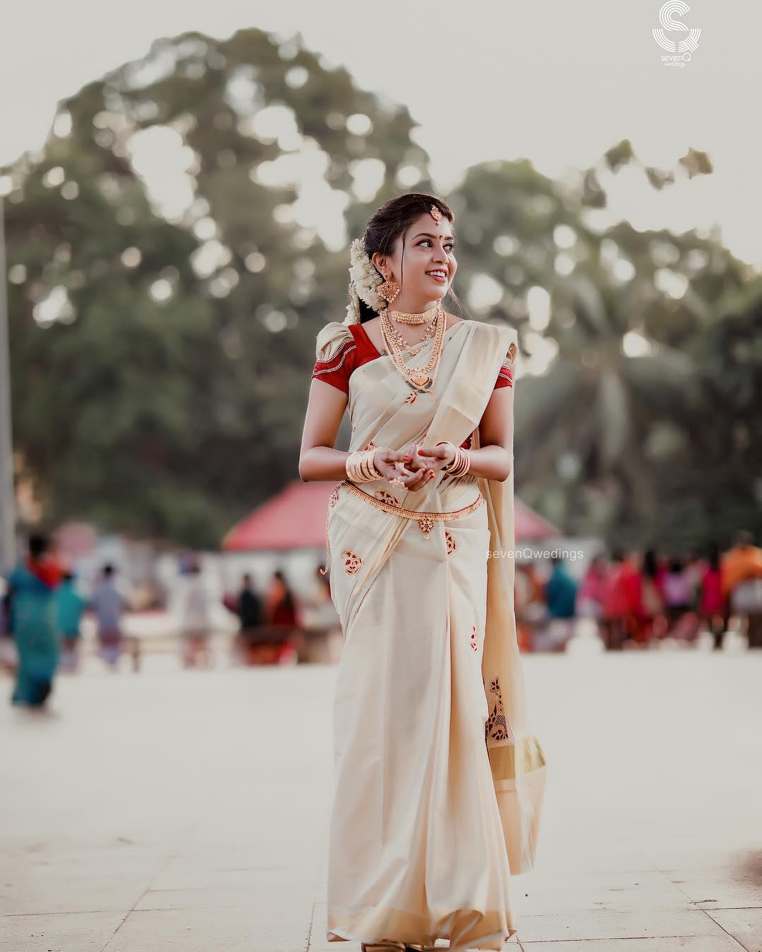 Kerala off-white with zari border semi tissue handwoven and hand painted  mural designed saree