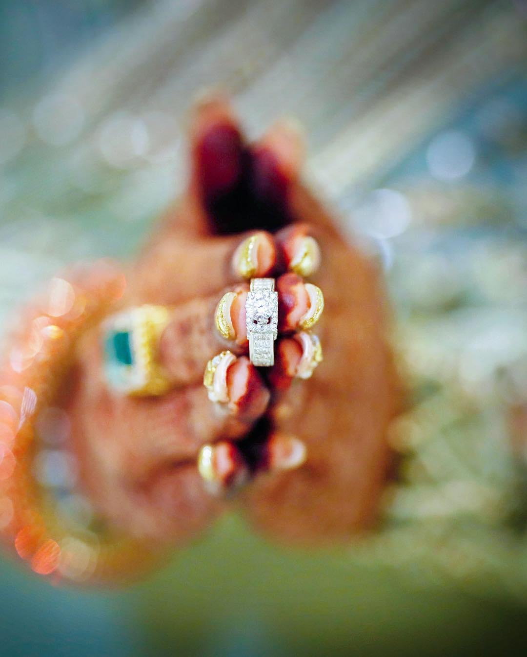 Woman with Red Nails Wearing an Engagement Ring · Free Stock Photo