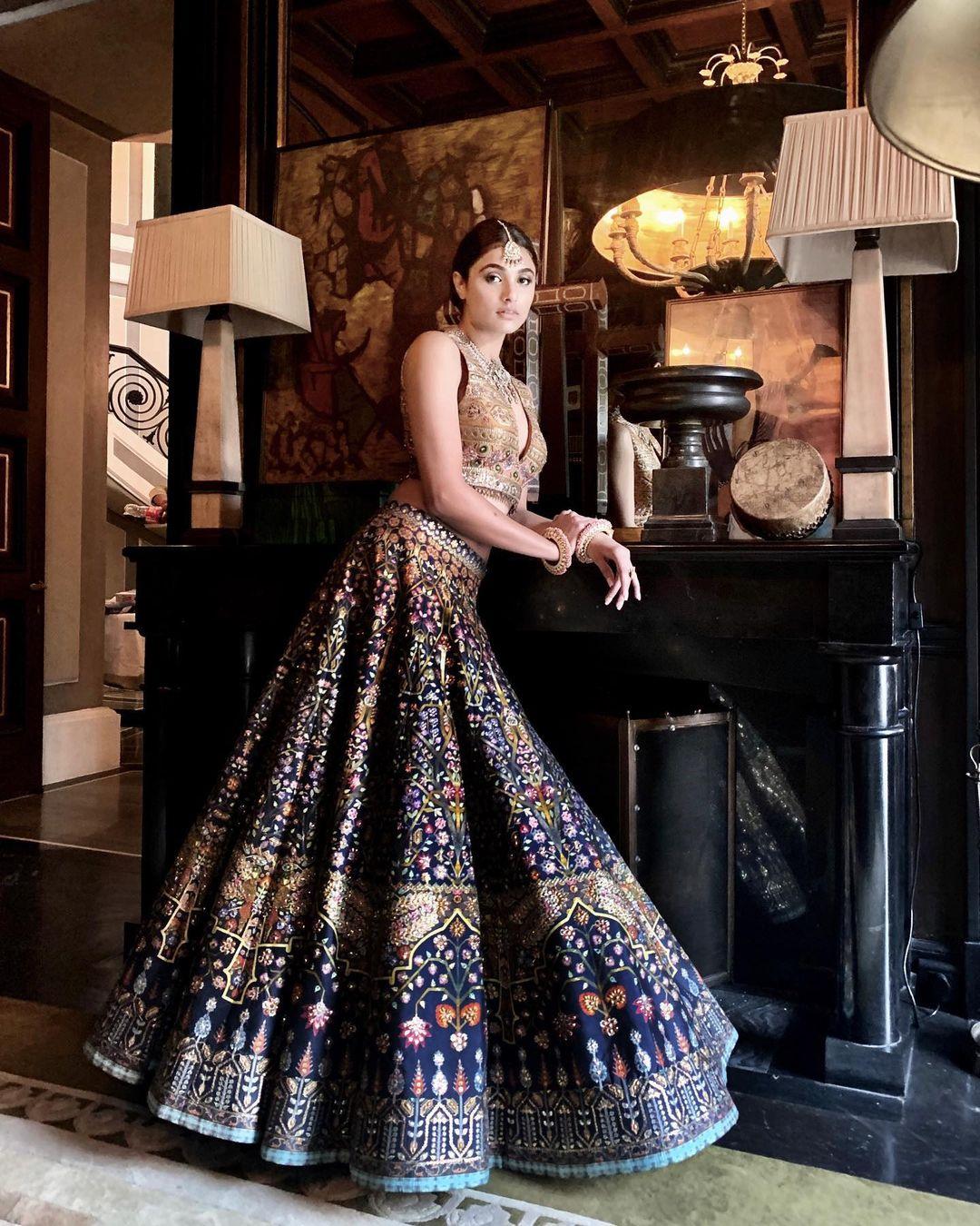 Photo of Bride Dancing in Navy Blue Lehenga with Pink Dupatta | Blue  bridal, Choli dress, Bridal dresses