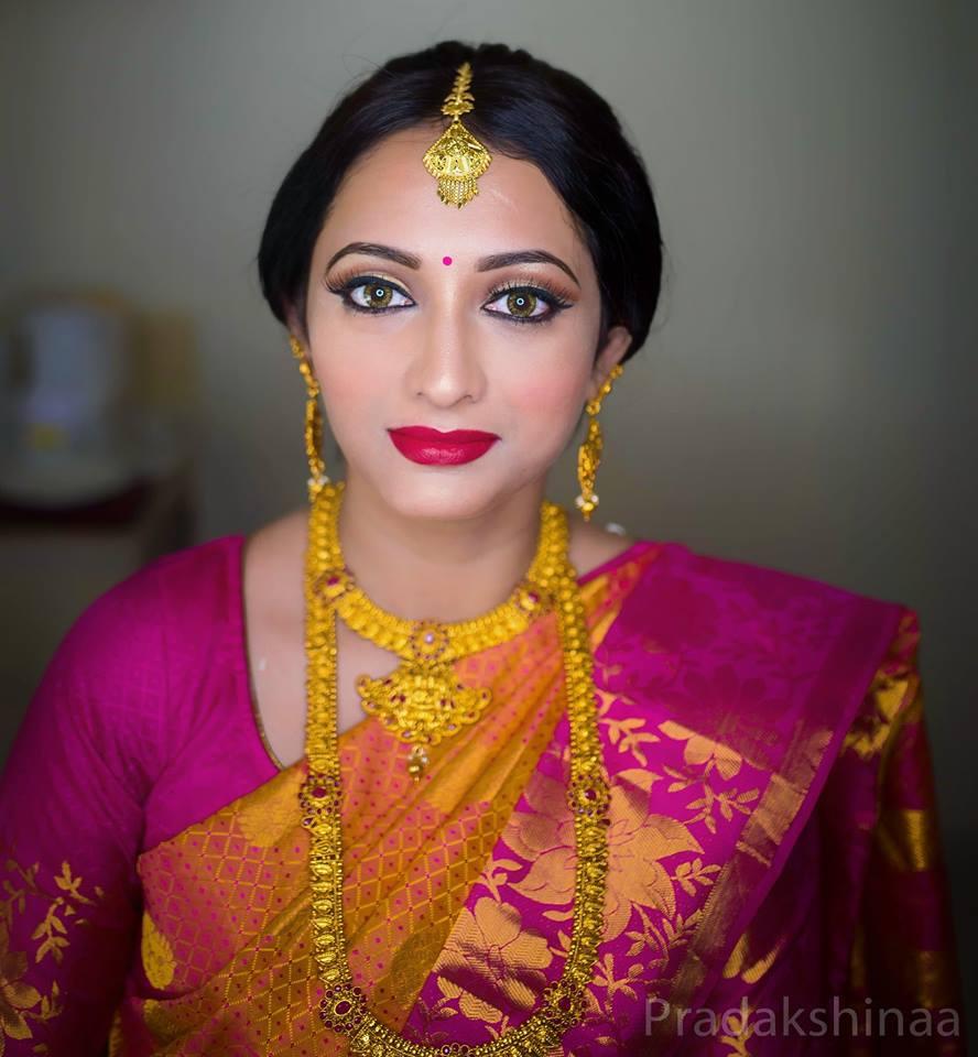 A Vibrant Tamil Bride In Her Colorful Bridal Saree – Shopzters