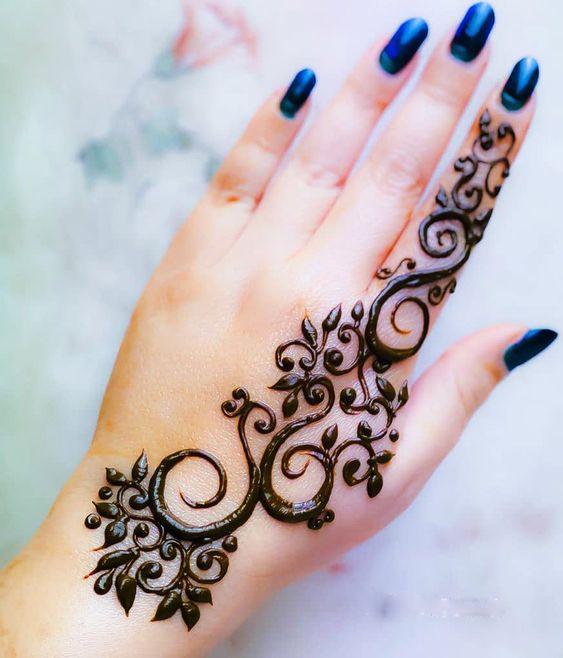 Woman's Hand with Henna Design Stock Photo - Alamy