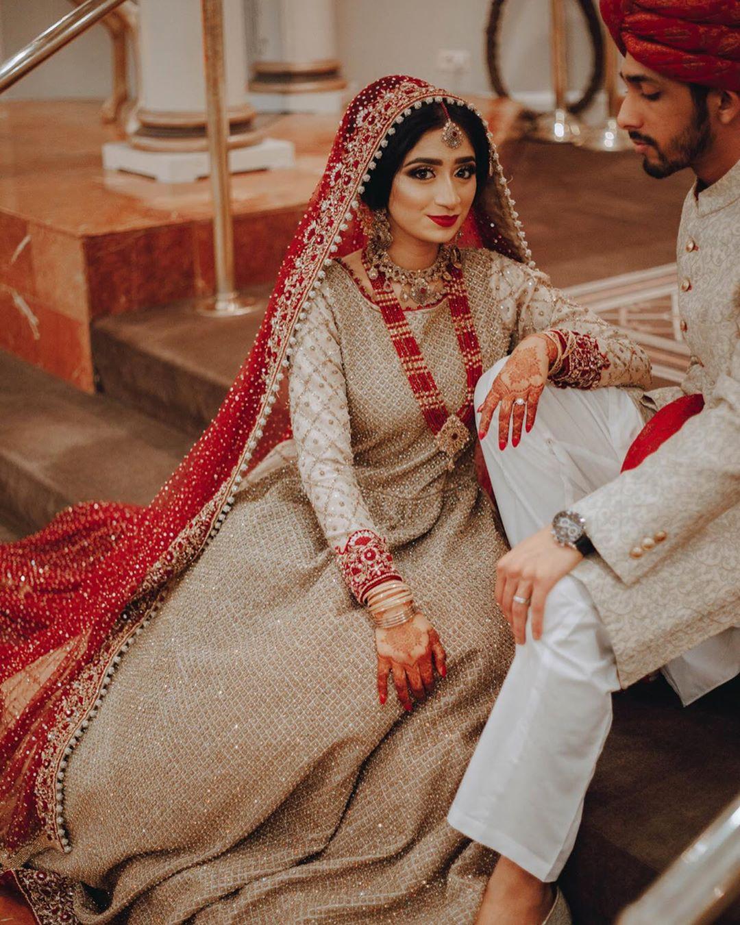 Grey net shirt and lehnga with red dupatta