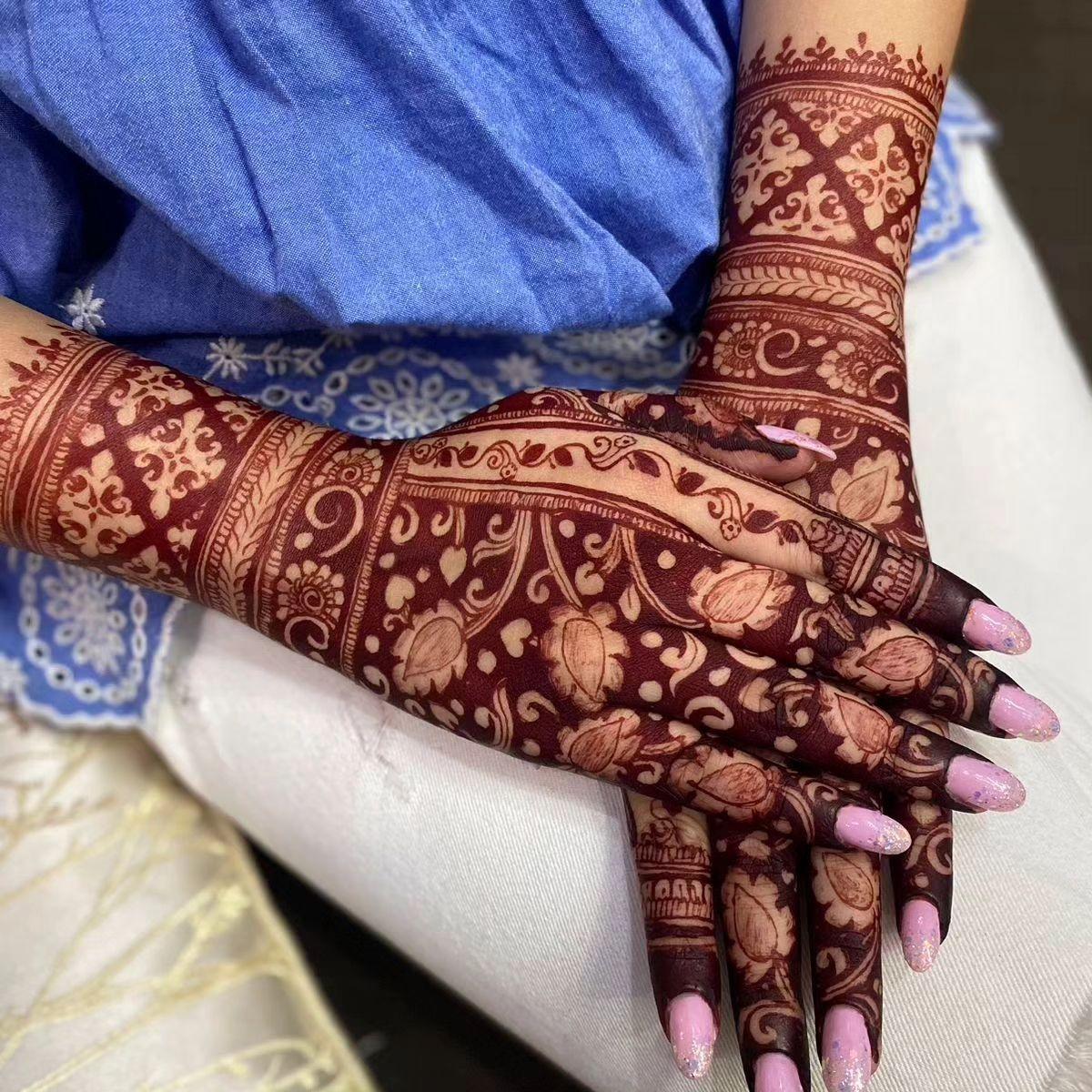 back full hand bridal mehndi design