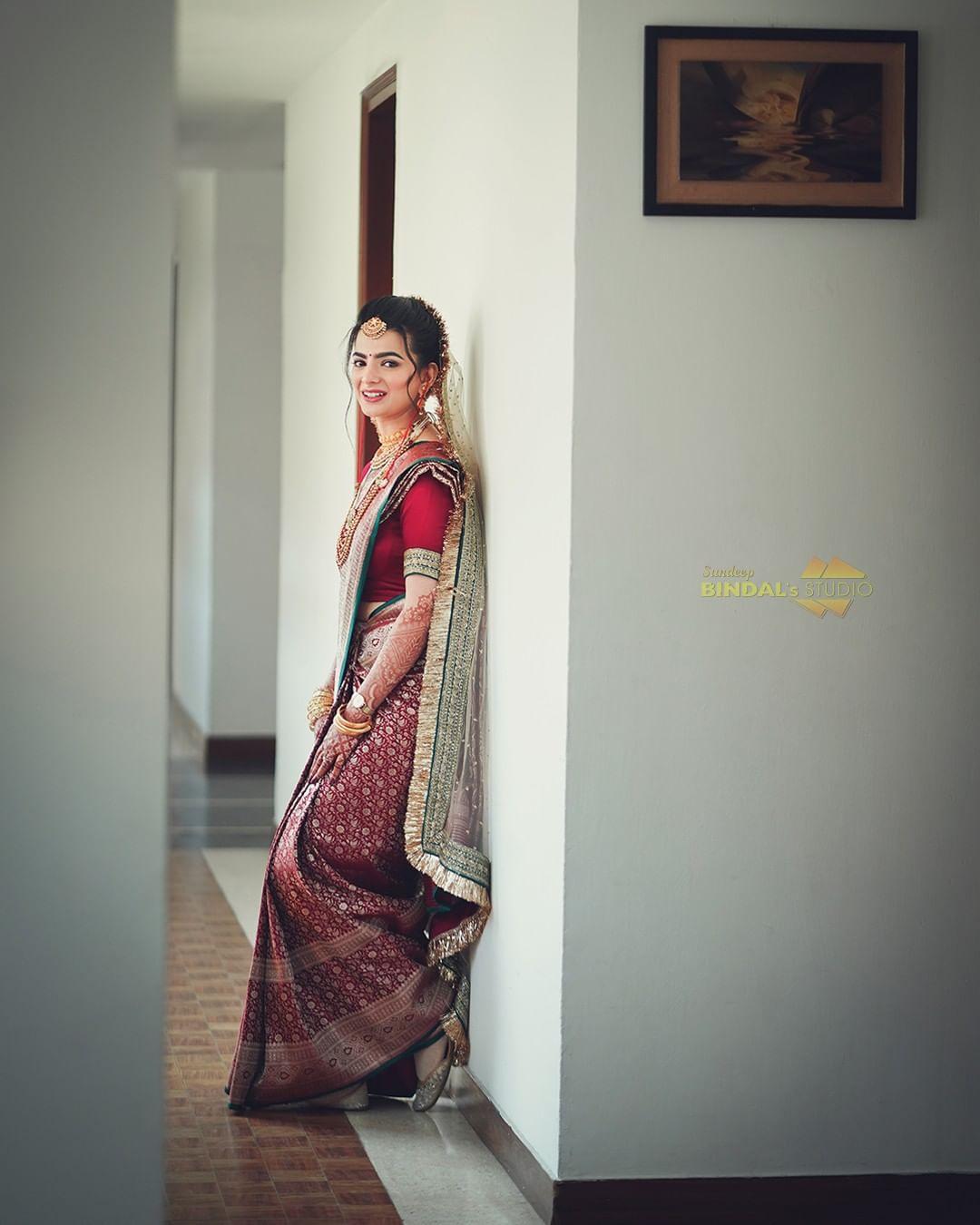 Saranya looks ravishing as she poses in a saree during a photoshoot.