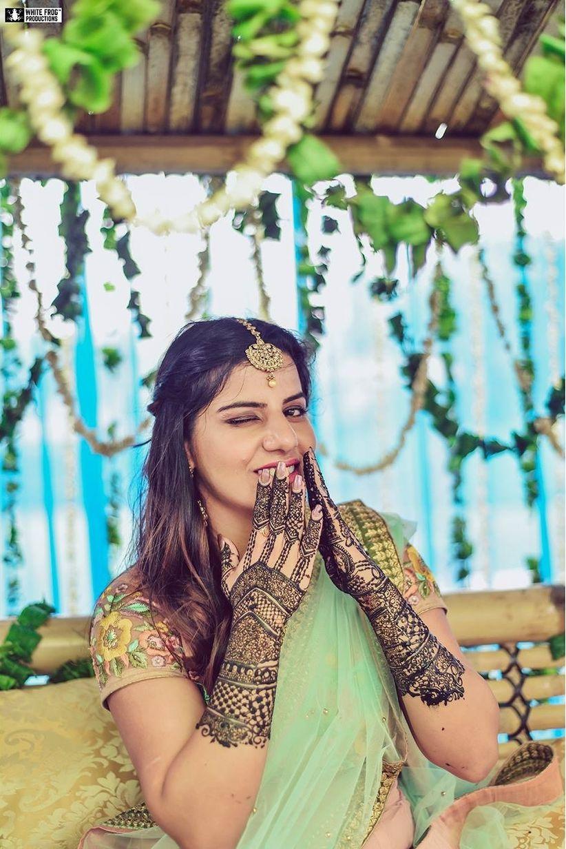 Woow the beautiful glimpse of mehendi ceremony | happy bride along her  friends poseing … | Bridal photography poses, Indian wedding couple  photography, Bridal poses