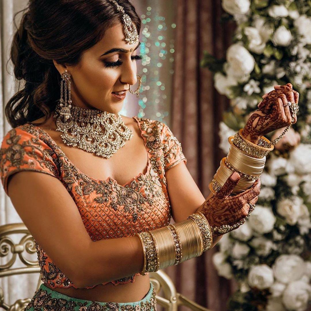 Traditional Henna Hand Decoration With Bangles