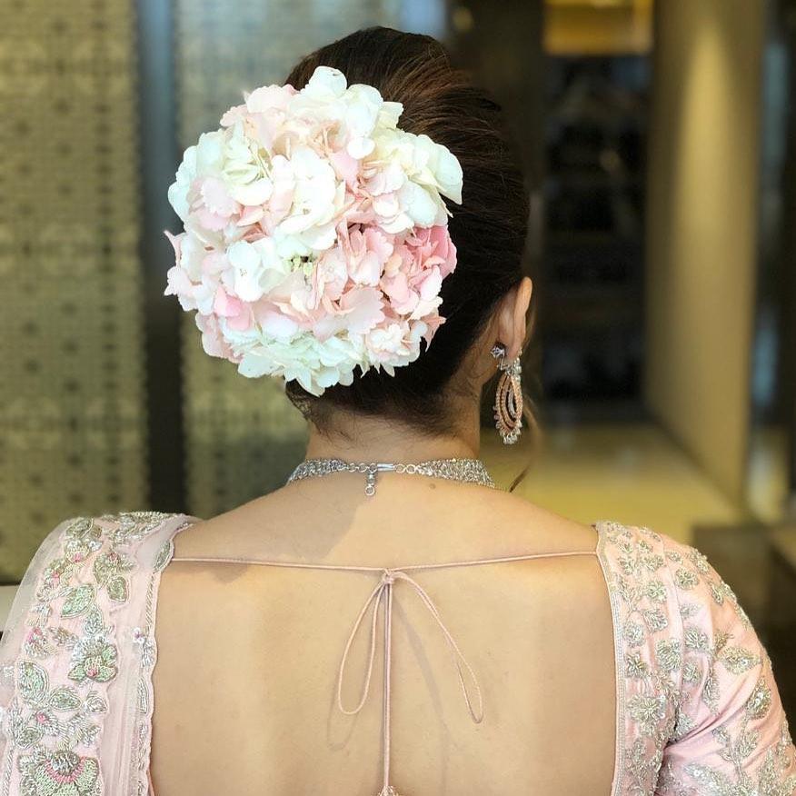 Bridal hairstyles with flowers All the Bollywood celebrity inspiration you  need  Vogue India