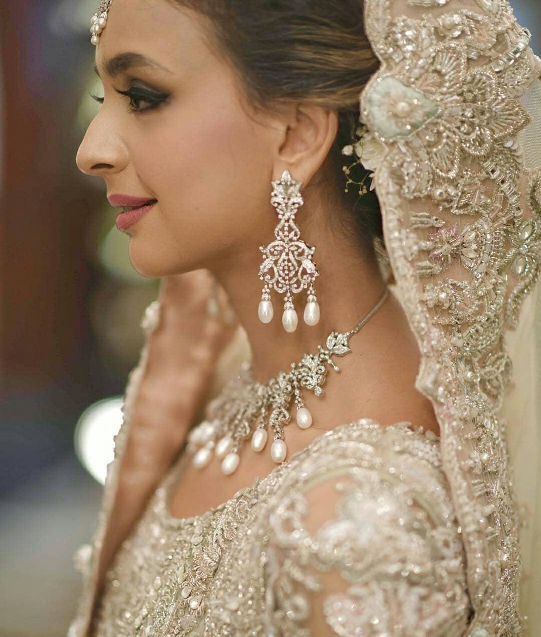 Which is the best earring style to wear on a lehenga? - Quora