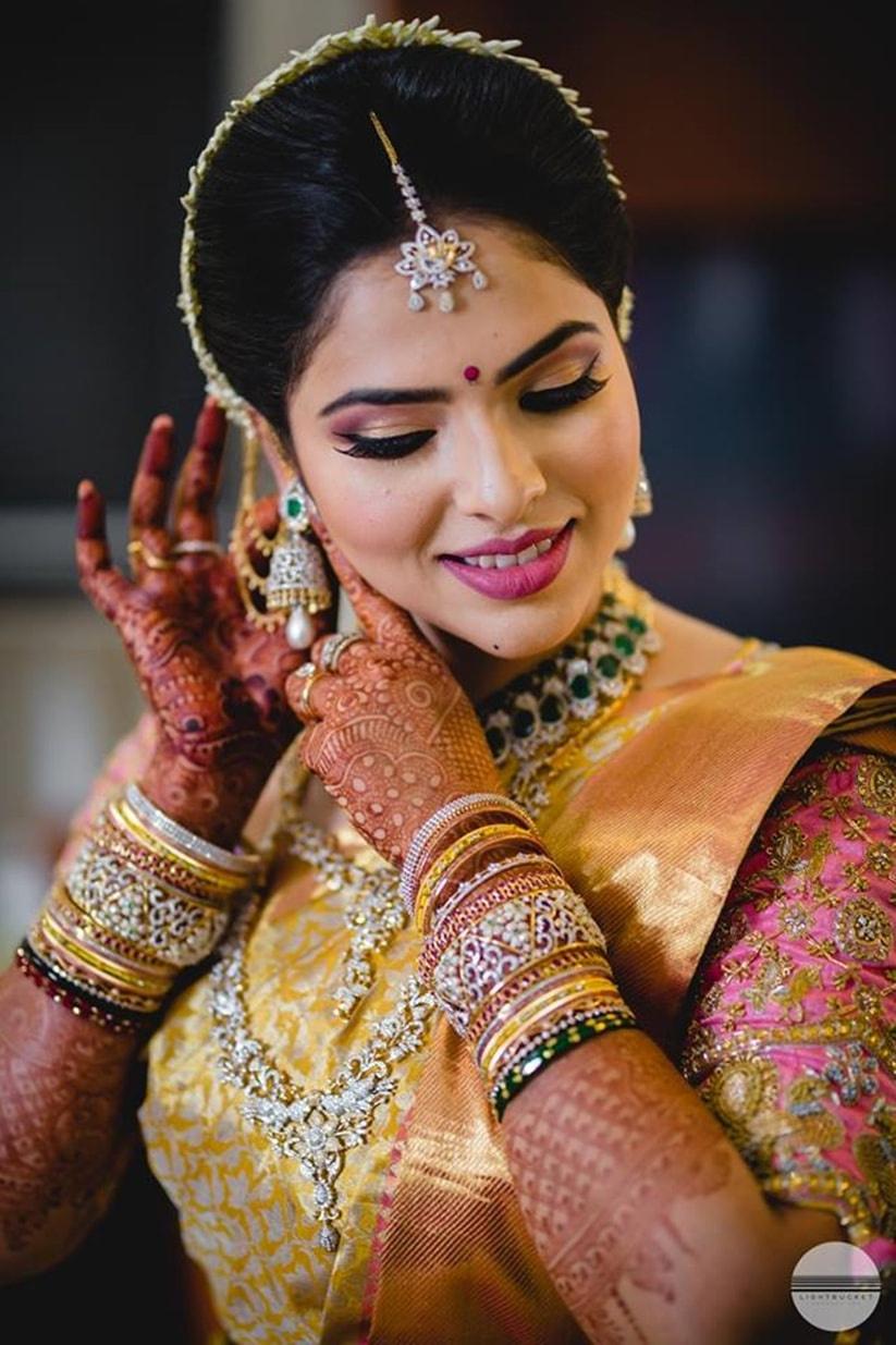 Mouni Roy Makes For a Stunning South Indian Bride in a White And Red Silk  Saree, Gajra And Mathapati