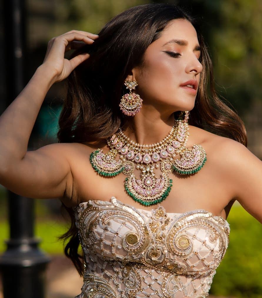 Free Photos - An Attractive Woman Wearing Traditional Indian Clothing,  Including A Necklace And Earrings. She Is Posing For The Camera, Exuding A  Sense Of Confidence And Elegance. The Woman Is Adorned