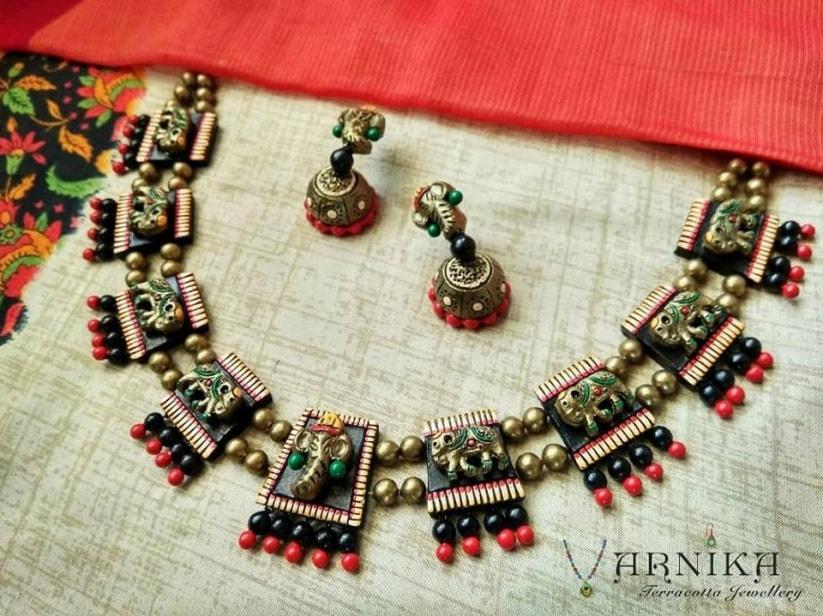 Brown, Gold Brown And Gold Terracotta Jhumka at Rs 960/pair in Hyderabad |  ID: 17316872462