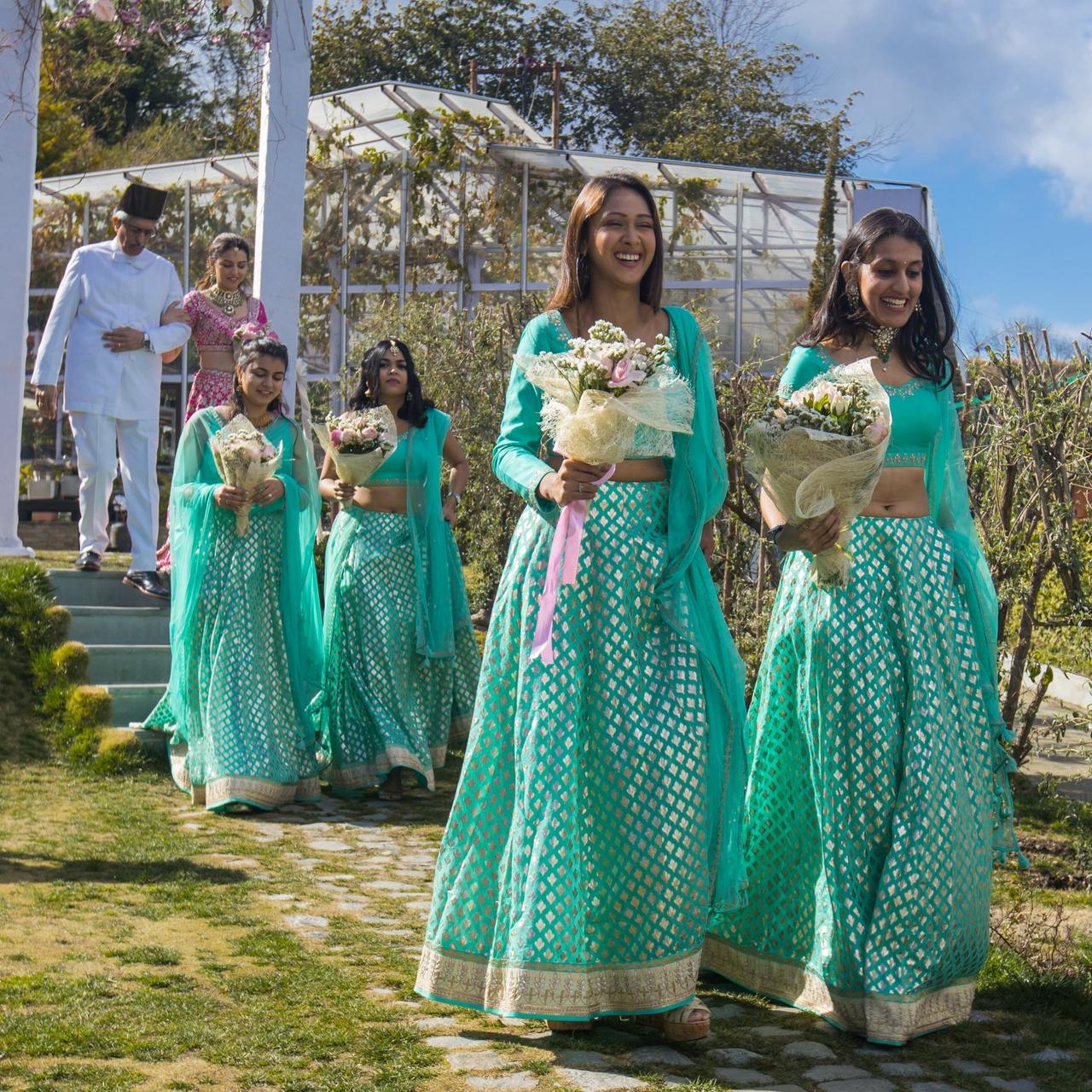 Buy a Coral & Sea Green Bridal Lehenga For Wedding