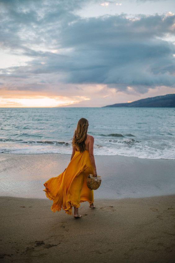 Girl posing on the beach Stock Photo by ©sergey_causelove 98325676