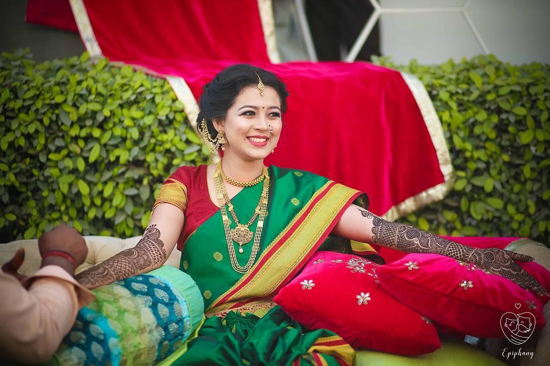 Photo of South Indian bride in an Olive Green saree for the Engagement