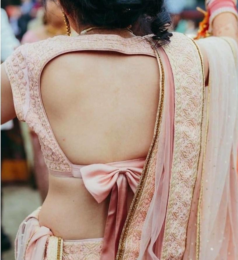 How to Carry a Deep Back Neck Blouse With Elegance at Indian Weddings?