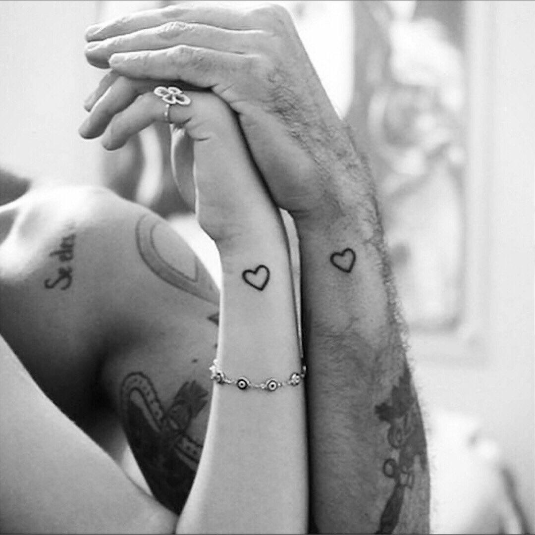 Young Couple Love Tattoos Cuddling Holding Stock Photo 379976905 |  Shutterstock