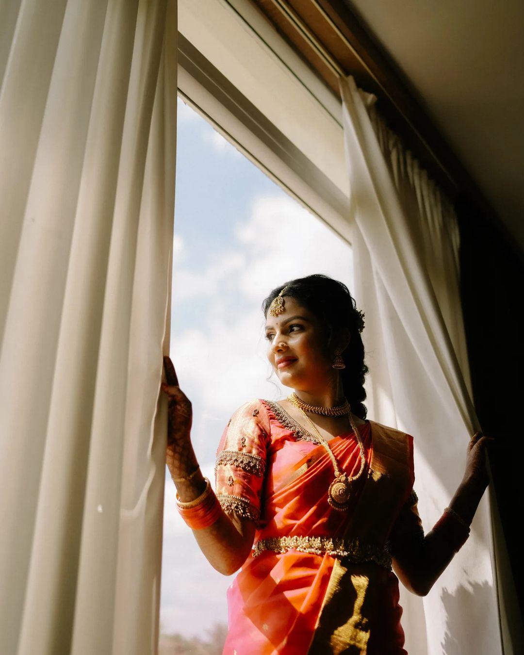 Traditional Indian Bridal Dress in Red and Gold