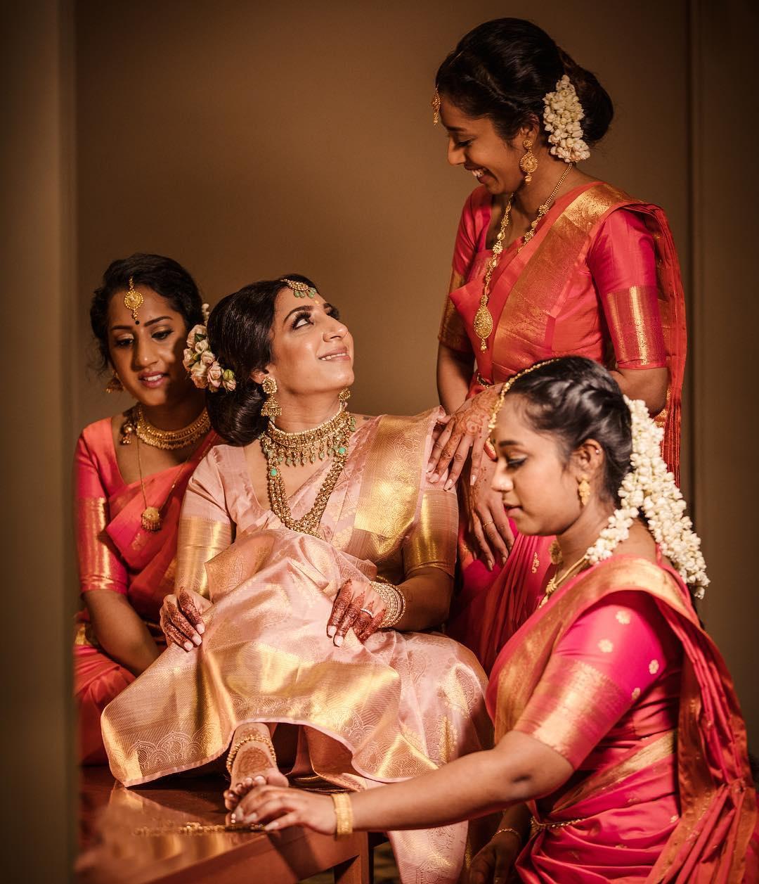 Intimate Coronial Wedding With The Bride In A Pretty Onion Pink Kanjeevaram  | WedMeGood