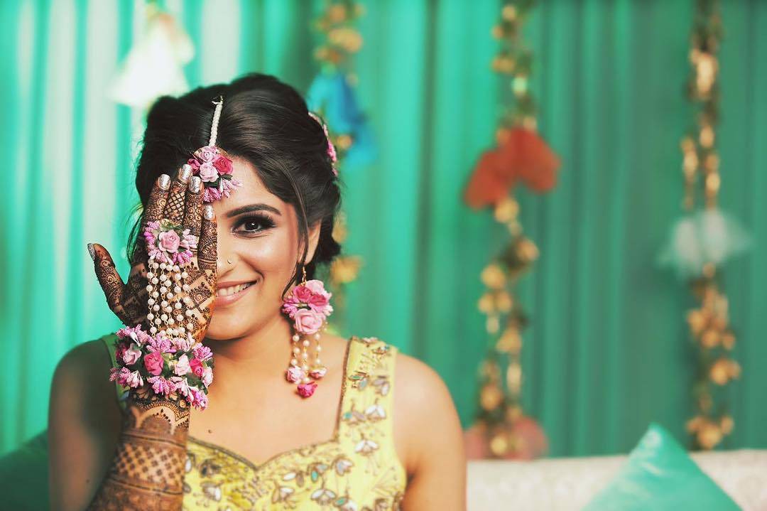 Bride with flower on sale jewellery