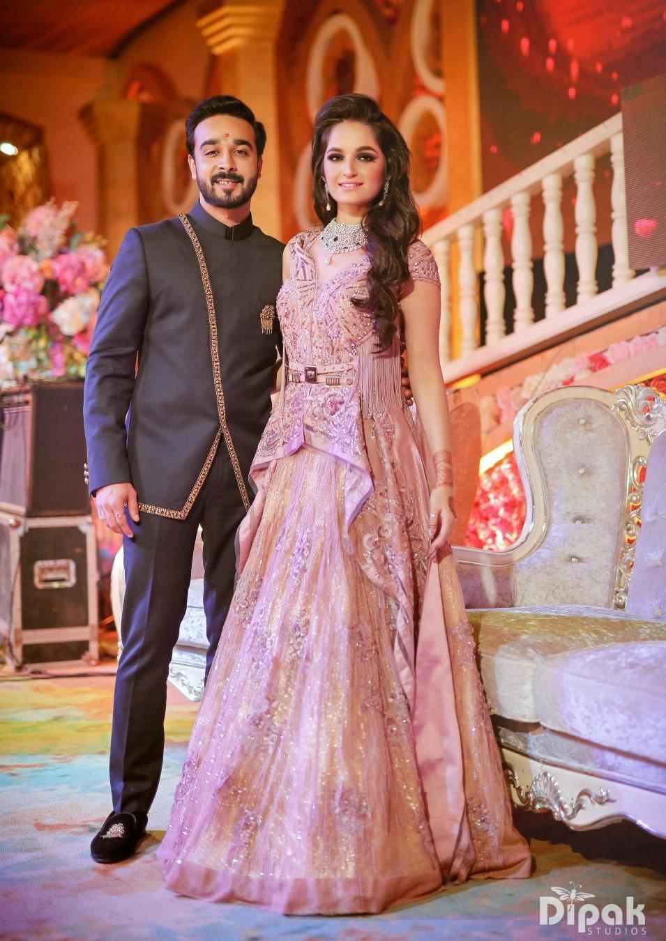 Pretty Purple Wedding Wear For Couple