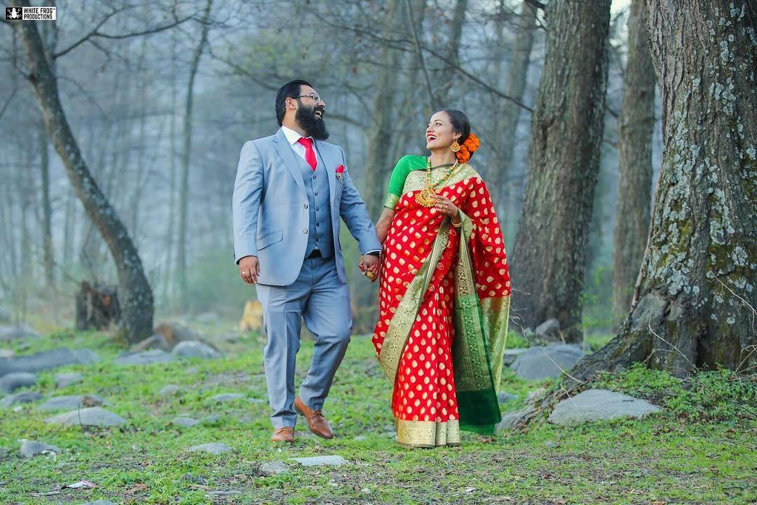 Which color blazer should a groom wear if the bride is wearing a hot pink  sari? - Quora
