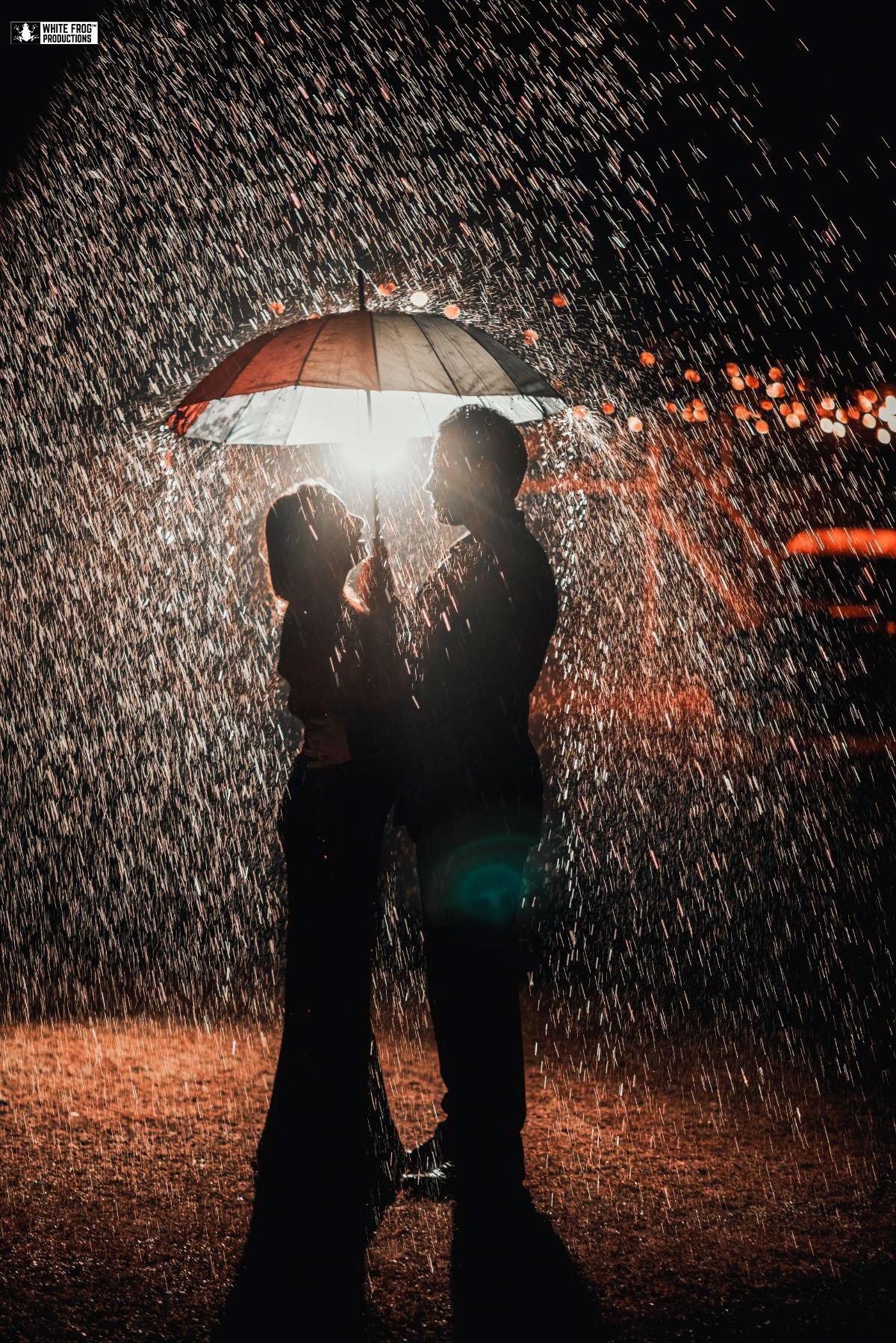 romantic couple in rainy season