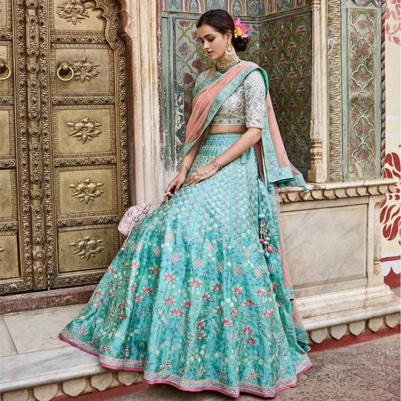 Net Georgette work and emboidered Lehenga in Peach and Green  |lovelyweddingmall.com |