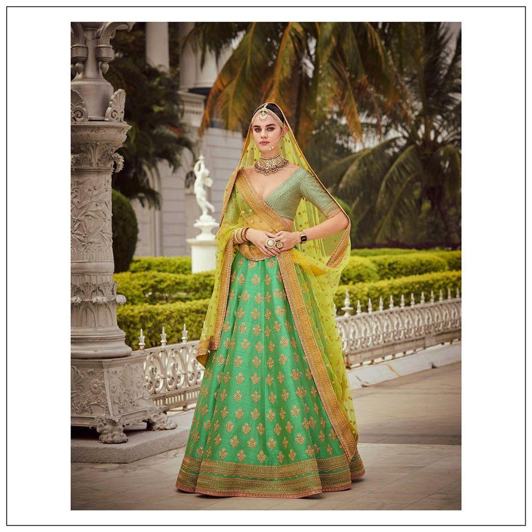 Buy ETHNIC BROCADE LEHENGA CHOLI IN GLAMOROUS PEACH AND BLUE COLOR at Rs.  1750 online from Surati Fabric lehenga choli : SF-ETHNIC-PEACH BLUE