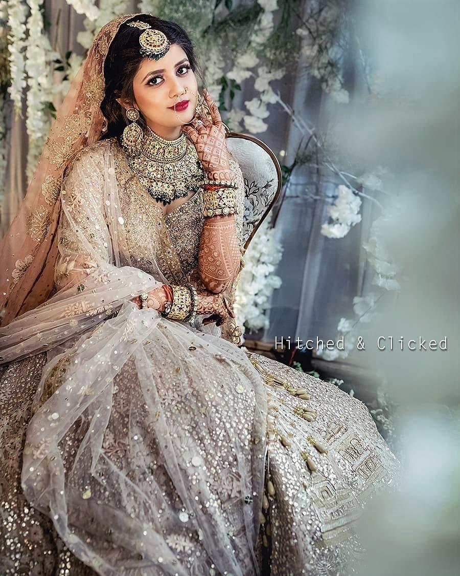 Portrait of beautiful indian brumette girl or hindu woman model.  Traditional Indian costume lehenga choli. 10445798 Stock Photo at Vecteezy