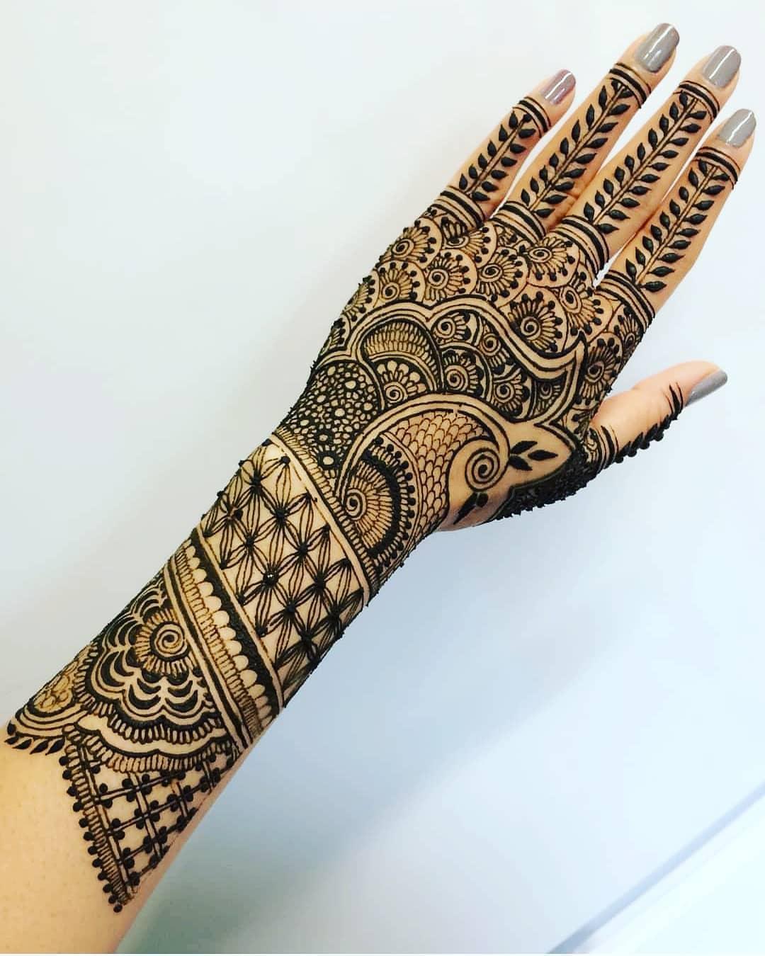 unique peacock mehndi design