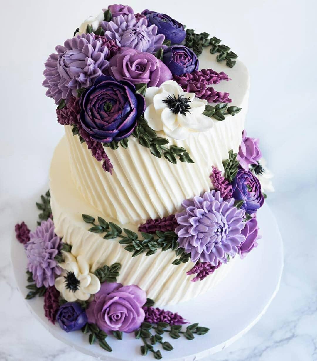 De Cakery - A beautiful 10th anniversary cake, designed like a Christian  wedding scene. The bride and groom kissing under a beautiful flower studded  arch. Everything on this cake is edible and