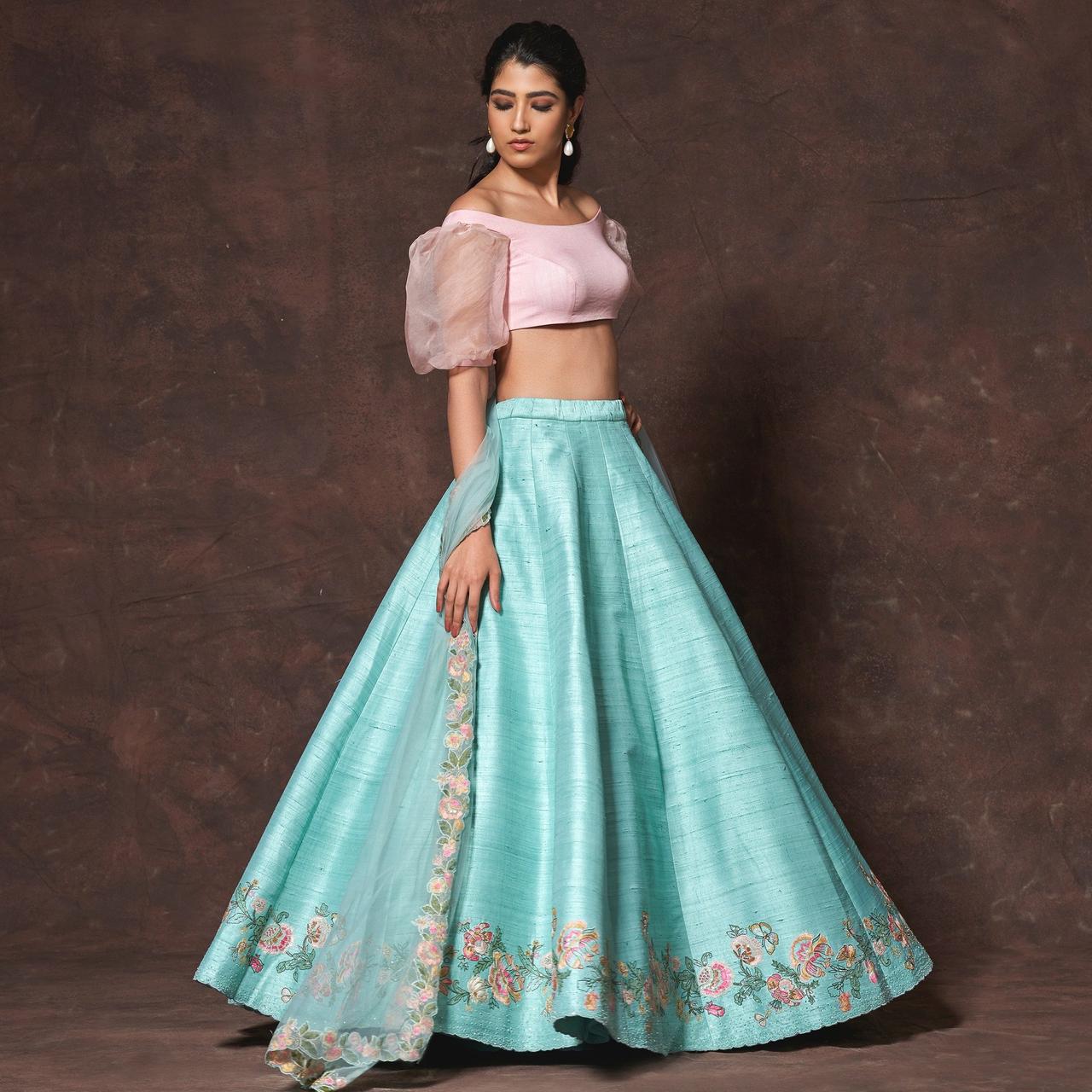 Odette Women Blue Net Embroidered Stitched Lehenga With Unstitched Blo