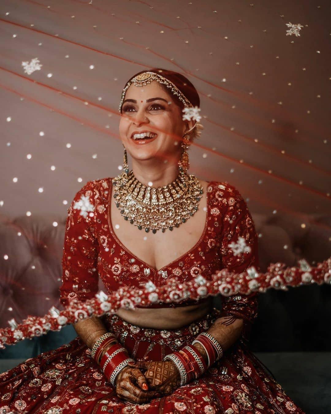 Bride in Maroon Velvet Lehenga - Shaadiwish