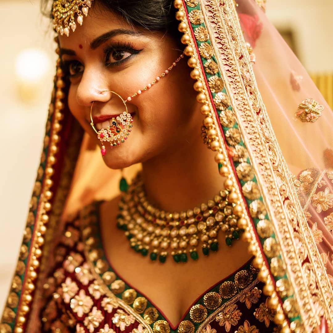 Close-up of an Indian bride in wearing nose ring Stock Photo - Alamy