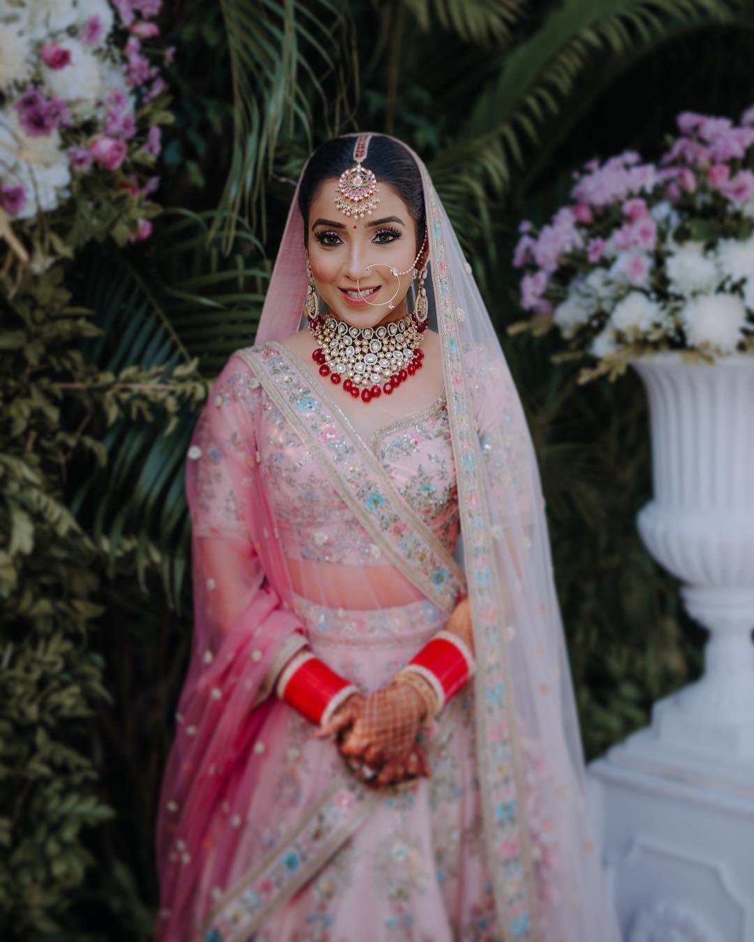 The Sabyasachi Bride Donned A Pink Lehenga With Intricate Gold Embroidery  And Exquisite Jewellery