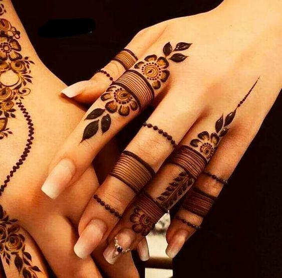 I like the bands of design on the arm, it's a unique bridal mehndi pattern.  | Indian henna designs, Bridal mehendi designs hands, Henna designs