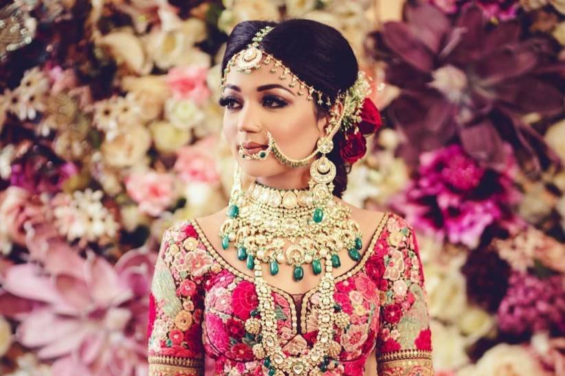 Bride in Rose Colored Lehenga, Jewelry, and Groom in White Ivory Sherwani, Indian  Wedding