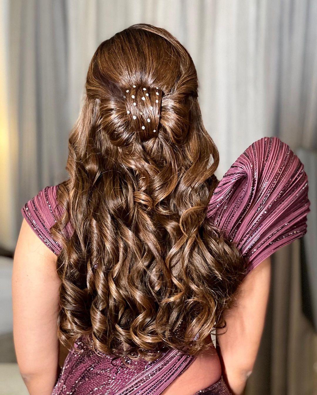 7 Best Hairstyles for Wavy Hair, According to Stylists