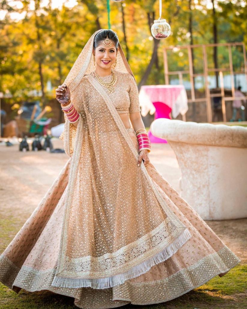 Beige Gold Designer Heavy Embroidered Net Wedding & Bridal Lehenga | Party  wear lehenga, Bridal lehenga, Indian party wear