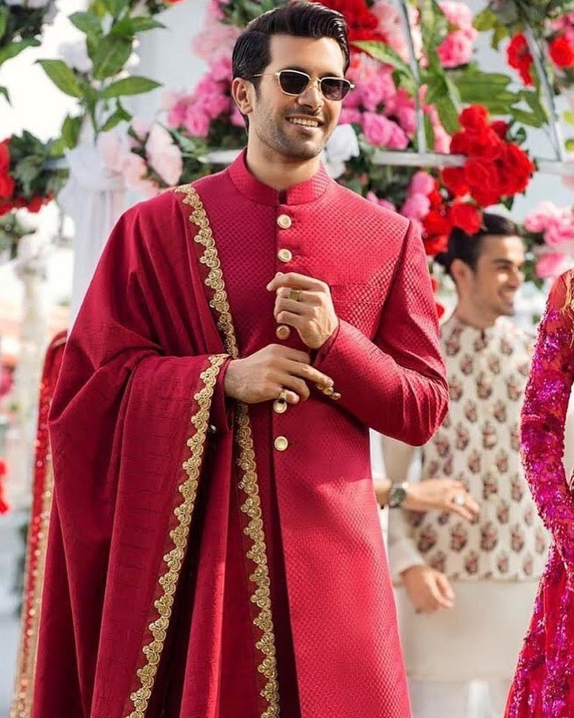 red lehenga matching groom dress Cinosural International School