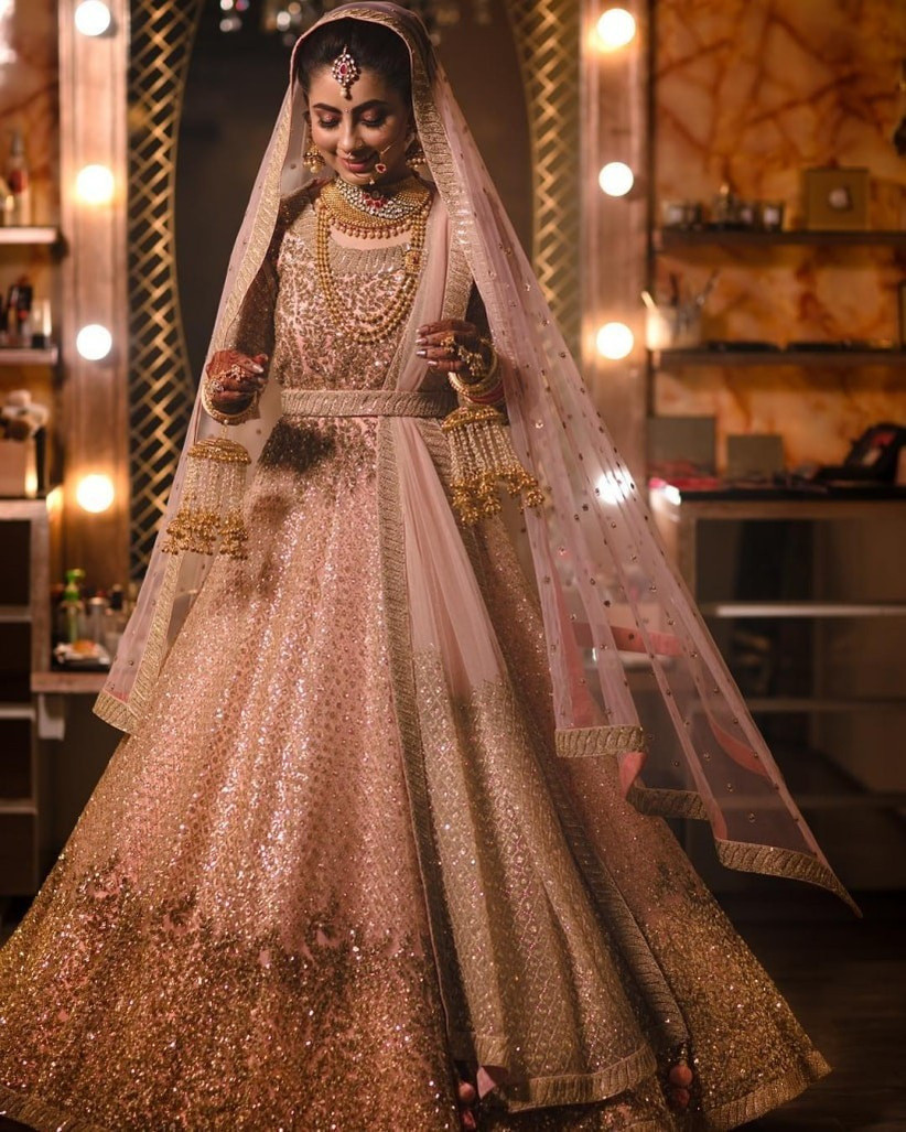 Buy Gold Net Embroidered Floral Sweetheart Metallic Bridal Lehenga Set For  Women by Seema Gujral Online at Aza Fashions.