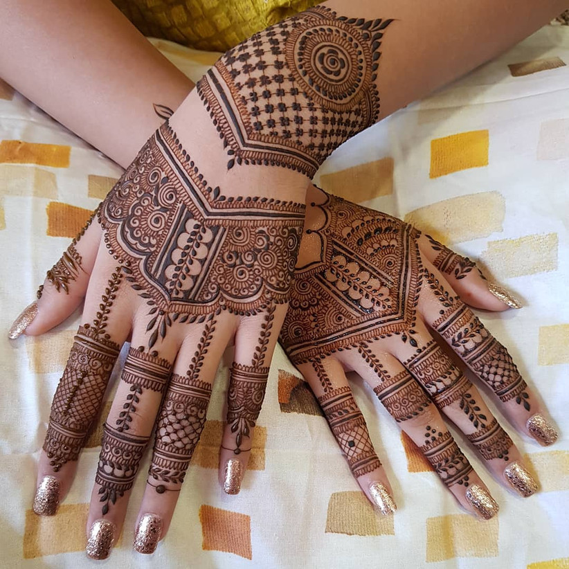 Dainty Back Hand Mehndi Design For Brides