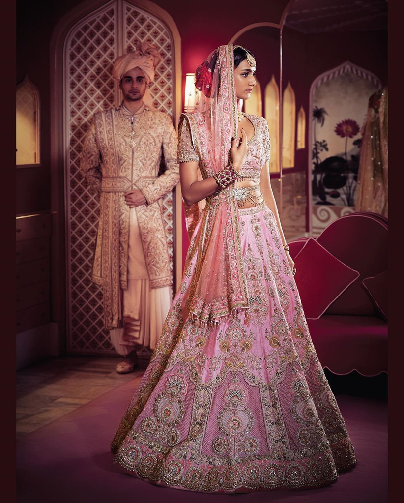 Photo of Light pink dupatta waist belt green jewellery | Backless wedding  dress, Indian bridal outfits, Bridal outfits