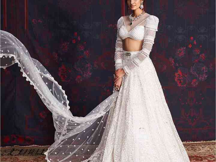 white lehenga bride