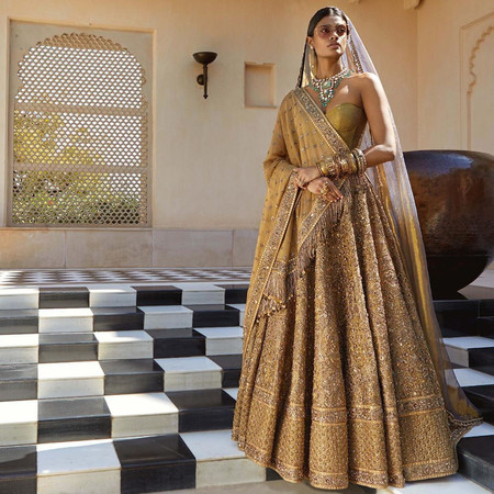 9 Designer Gold Lehenga Ideas to Look Like a Goddess on Your D-day